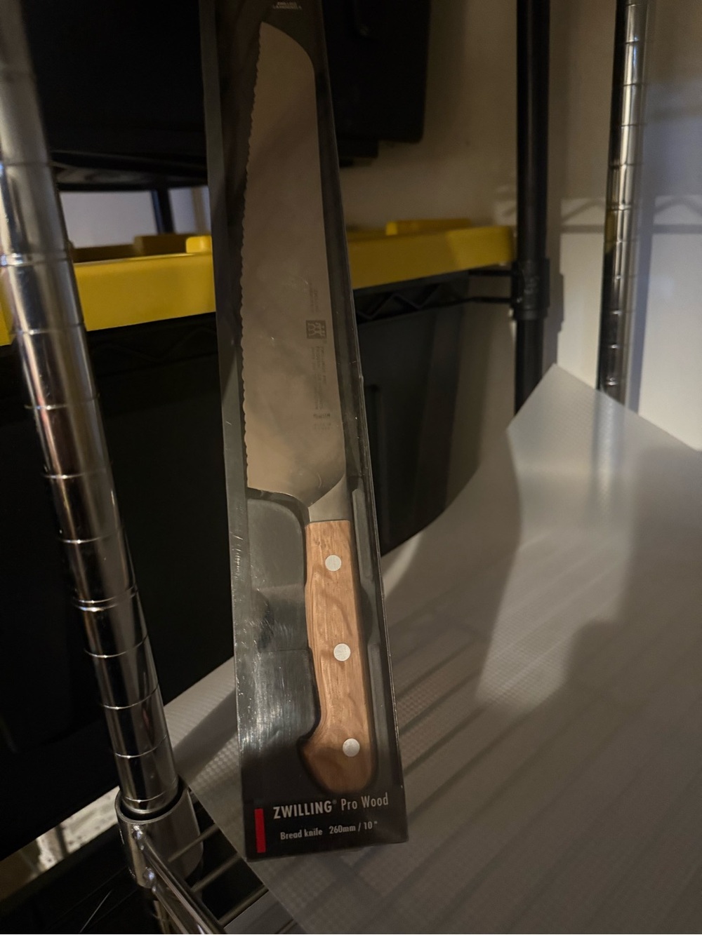 Zwilling Pour Homme Bread Knife with Wood-Tone Handle - Silver Blade